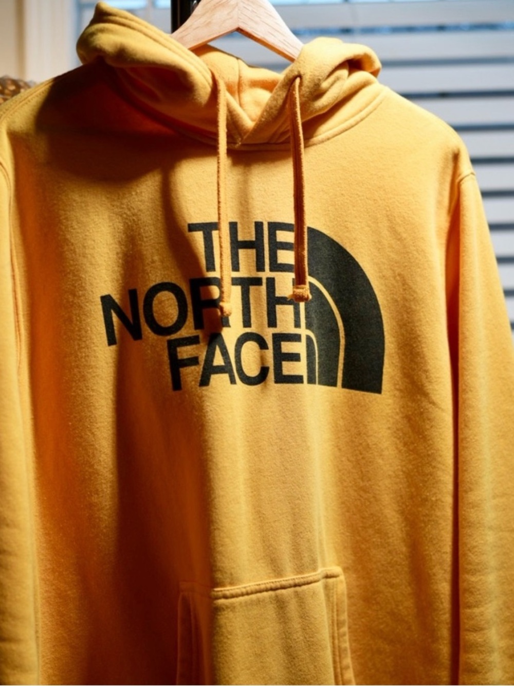 The North Face Mustard Yellow Pullover Hoodie with Black Logo
